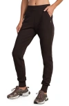 Rhone Dreamglow Tapered Pants In Brown