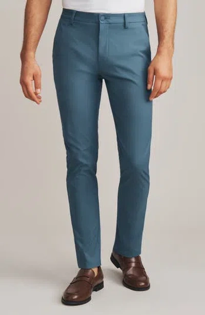 Rhone Gotham Slim Fit Water Repellent Pants In Blue