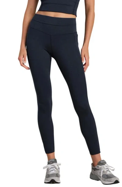 Rhone Heather Revive Pocket 7/8 Leggings In Blue