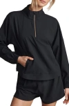 Rhone Mirage Water-repellent Half-zip Jacket In Black