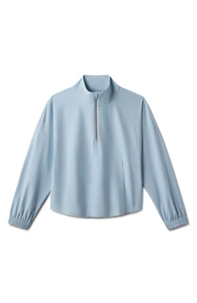 Rhone Mirage Water-repellent Half-zip Jacket In Blue