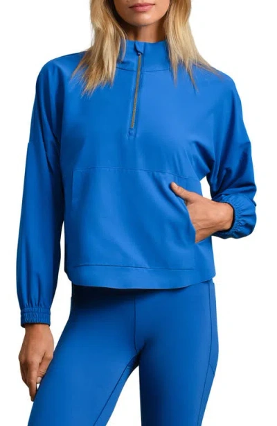 Rhone Mirage Water-repellent Half-zip Jacket In Blue