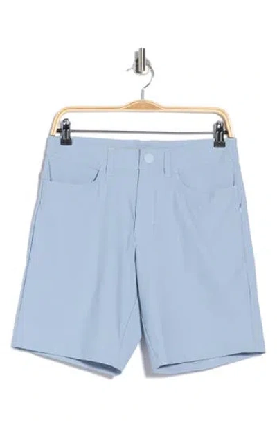 Rhone Momentum Water Repellent 9-inch Golf Shorts In Blue