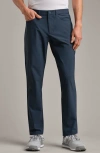 Rhone Momentum Water Repellent Flat Front Golf Pants In Blue