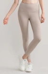 Rhone Revive Pockets 7/8 Leggings In Brown