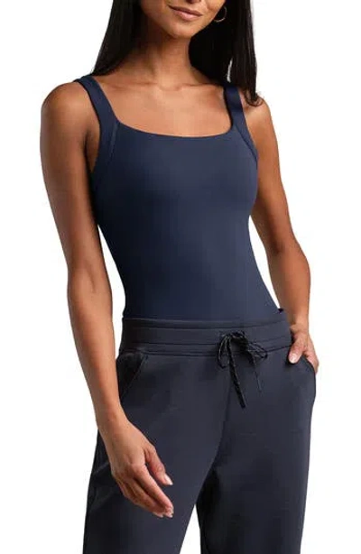 Rhone Ultimate Layer Performance Bodysuit In Blue