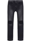 Rhude Distressed Jeans In Black