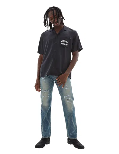 Rhude Jeans With Scuffed Effect In Blue