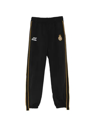 Rhude Logo-embroidered Side-stripe Track Pants In Black