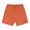 Rhude Orange Script Logo Shorts In Multi