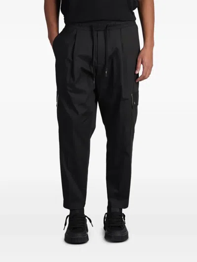 Rhun Tapered Trousers In Black