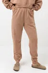 RHYTHM STACKED TRACK PANT IN CARAMEL
