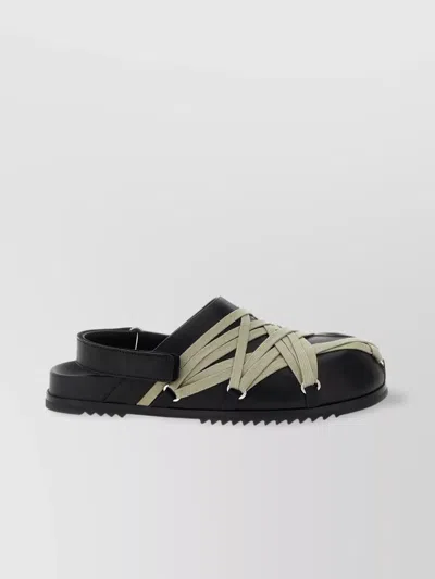 RICK OWENS CROSSED RUBBER SOLE SANDALS