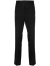 RICK OWENS OFF-CENTRE TAPERED-LEG TROUSERS