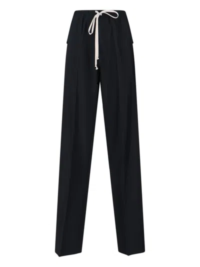 RICK OWENS TRACKSUIT BOTTOMS IN BLACK VISCOSE BLEND