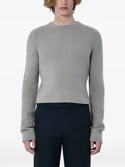 RIER BOUCLE-KNIT WOOL SWEATER
