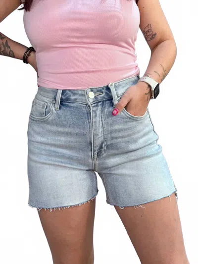 Risen Cassie High Rise Side Slit Raw Cut Hem Denim Shorts In Light Wash In Blue