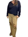 Risen High Rise Distressed Denim Jeans In Camel In Brown