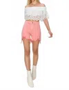 Risen High Rise Distressed Denim Shorts In Flamingo In Pink