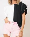 RISEN HIGH RISE DISTRESSED SHORTS IN ACID PINK