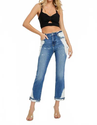 Risen High Rise Medium Bleach Denim Jeans In Blue