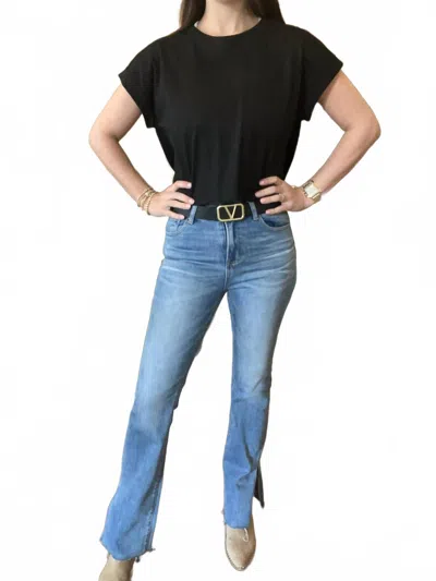 Risen High Rise Raw Hem Jeans In Medium Wash
