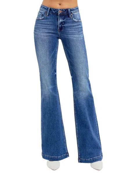 Risen Low-rise Flare Jeans In Dark In Blue