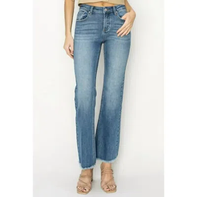 Risen Mid Rise Fray Hem Bootcut Jeans In Medium Wash