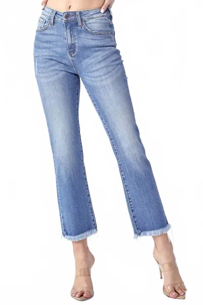 Risen Mid Rise Raw Hem Straight Denim In Light Wash In Blue