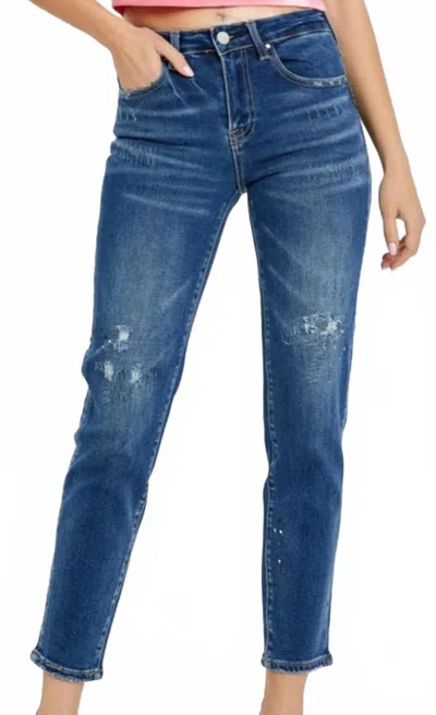 Risen Mid Rise Tapered Jeans In Blue