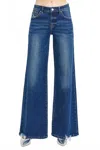 Risen Mid Rise Wide Leg Jeans In Dark Wash In Blue