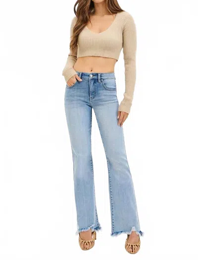 Risen Tummy Control Mid Rise Flare Jean With Frayed Hem In Medium Wash In Blue