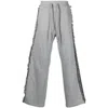 Ritos Embroidered-detail Track Pants In Grey