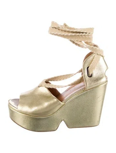 Pre-owned Robert Clergerie Leather T-strap Pumps In Gold