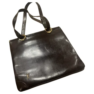 Pre-owned Roberta Di Camerino 1980s Iconic Brown Leather And Brass Shoulder Bag By