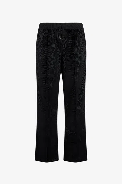 Roberto Cavalli Pants With Animal Print In Black