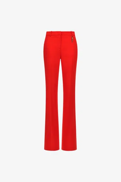 ROBERTO CAVALLI PANTS WITH FANG