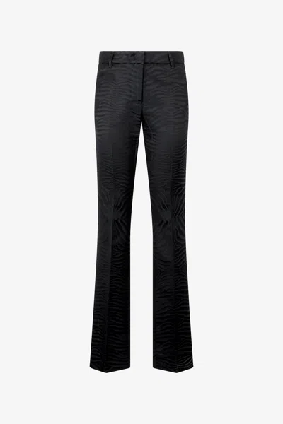 Roberto Cavalli Pants With Solid-color Tiger Skin Pattern In Black