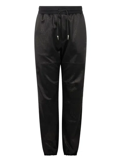 ROBERTO CAVALLI PATTERNED-JACQUARD TROUSERS