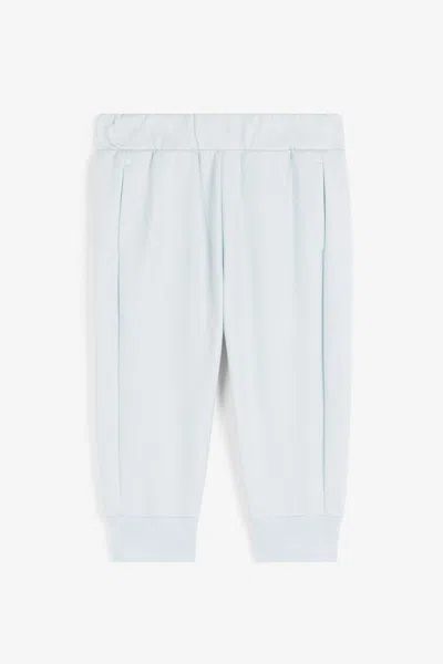Roberto Cavalli Rc Monogram-print Cotton Track Pants In Light Blue