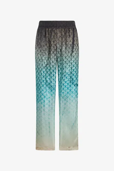 Roberto Cavalli Monogram-print Ombré Trousers In Blue