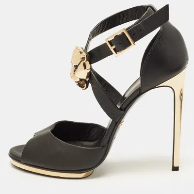 Pre-owned Roberto Cavalli Size 38.5 Black/gold Lion Head Embellished Leather Ankle Strap Sandals