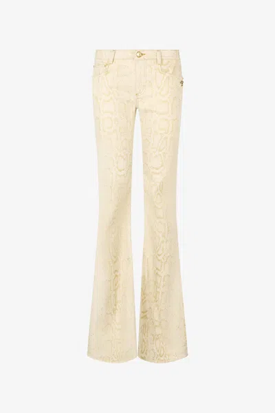 Roberto Cavalli White Flared Jeans With Gold Python Motif In Neutral