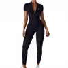 Rockstar Peach Scuba Zip Short Sleeve Jumpsuit In Black In Black