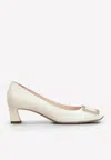 Roger Vivier Trompette 45 Metal Buckle Pumps In Patent Leather In Off-white