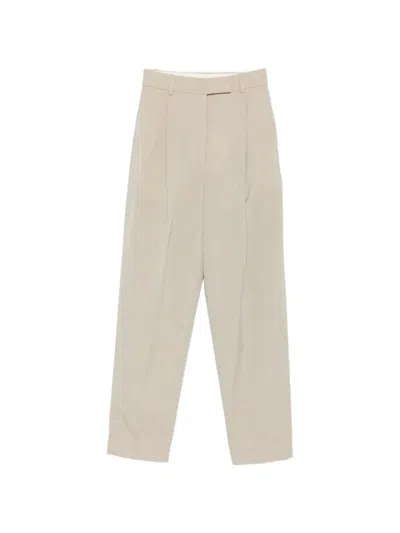 Rohe Pleated Tapered Trousers In Neutral