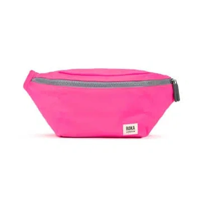 Roka London Cross Body Shoulder And Waist Bag Jubilee Sustainable Nylon In Neon Pink Medium Recycled In Burgundy