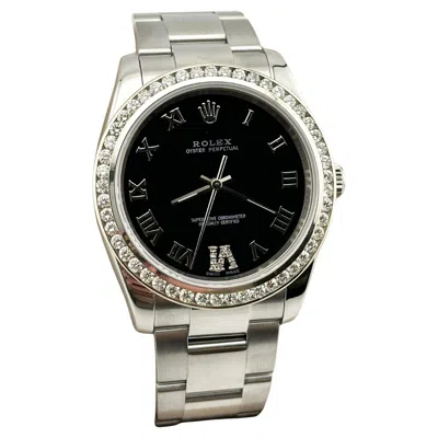 Pre-owned Rolex 114200 34mm Black Roman Dial Diamond Bezel Stainless Steel
