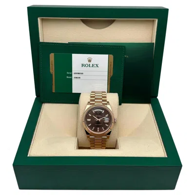 Pre-owned Rolex Day Date 40mm 18k Rose Gold Diamond Baguette Chocolate Dial Watch 228235 In Red