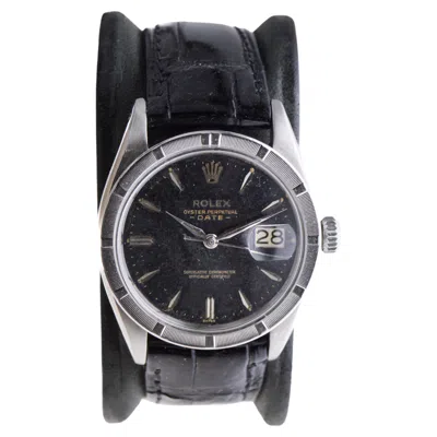 Pre-owned Rolex Oyster Perpetual Date With Rare Engine Turned Bezel And Black Dial 1960's